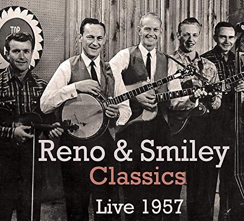 Black and white photo of four musicians with banjos and guitars.