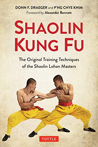 Book cover showing two shirtless men in yellow pants practicing Shaolin Kung Fu.