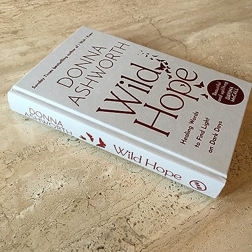 Gray book, “Wild Hope” by Donna Ashworth, with red bird illustrations.