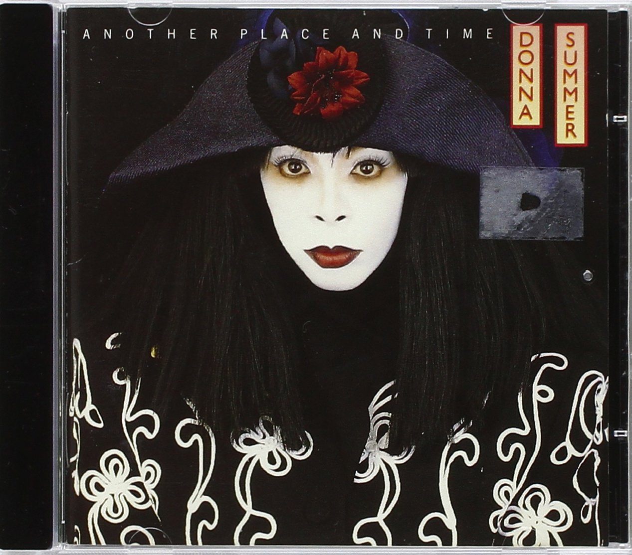 Donna Summer album cover: a woman in a wide-brimmed hat.