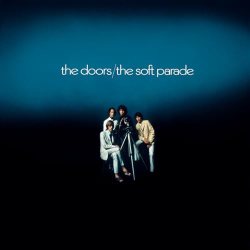 The Doors' "Soft Parade" album cover with band members and a camera.