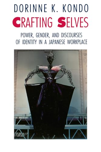 Book cover with abstract, dark metallic sculpture resembling a dress form.