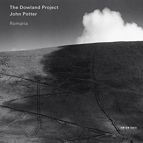 Black and white album cover with a cloudy sky over a field.