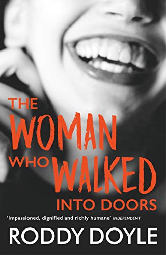 Book cover: close-up of a smiling mouth with red title text.