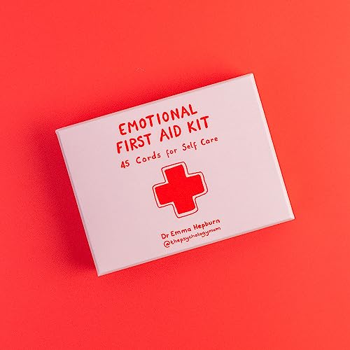 Pink "Emotional First Aid Kit" box with a red cross symbol.
