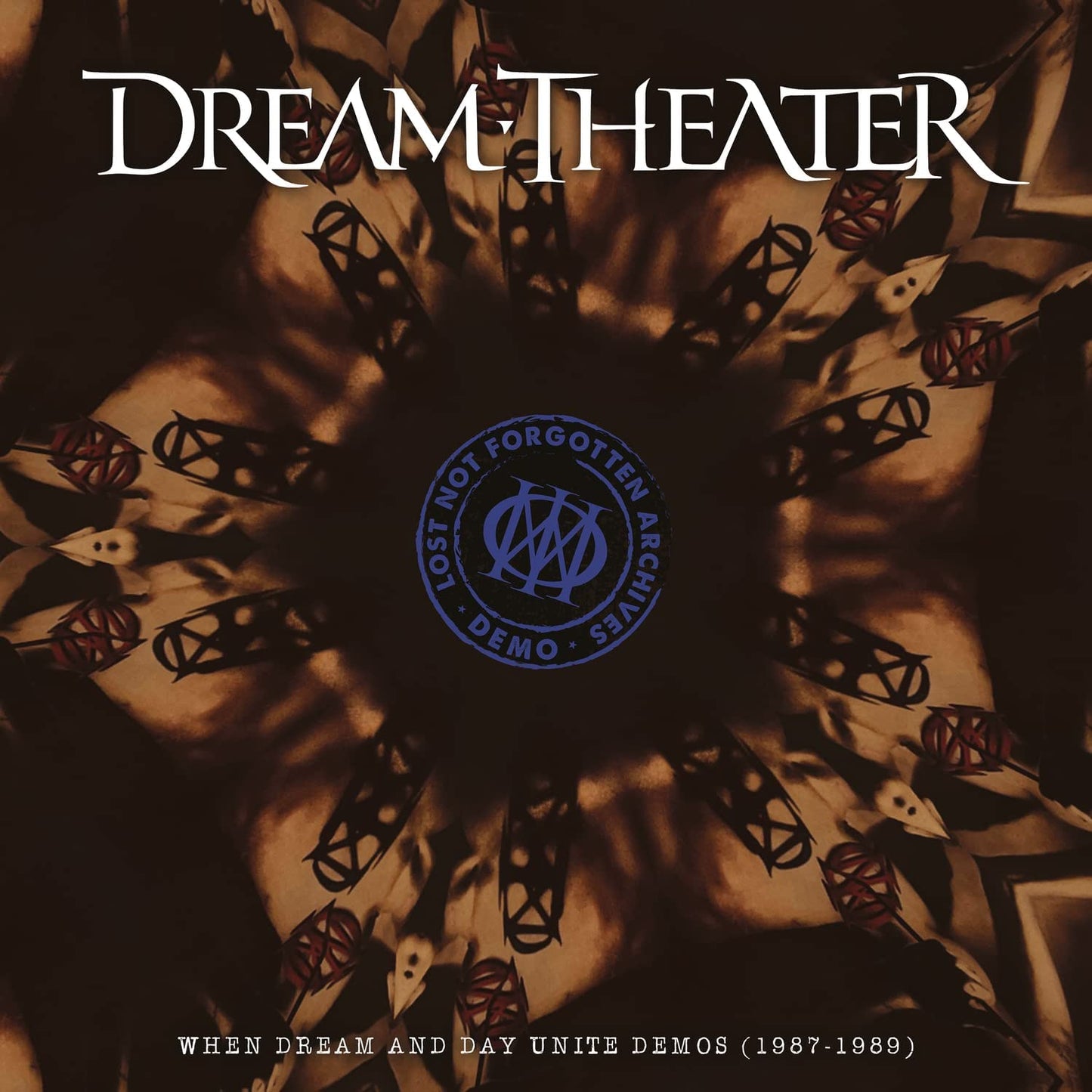 Dream Theater album cover: spiral design with band logo and text.