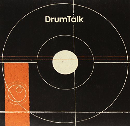 The alt text for the image is: "Black vinyl record cover with white and orange abstract design."