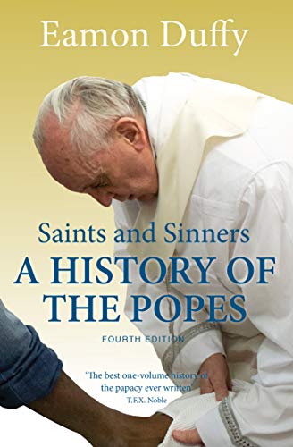 Book cover showing Pope Francis washing a person's foot against a light background.