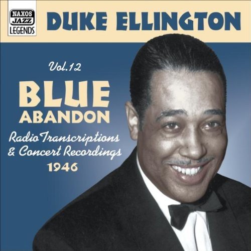 "Duke Ellington's album cover featuring a smiling man in a tuxedo against a blue background."