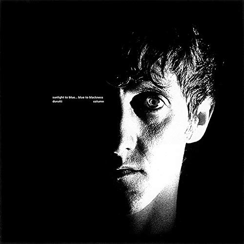 Black and white portrait of a man with text: "Durutti Column" album cover.