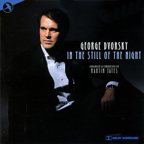CD cover featuring George Dvorsky in a tuxedo, dark background.