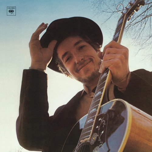 Bob Dylan with a guitar, album cover for "Nashville Skyline".