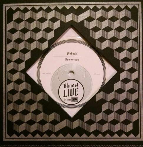 Black and white patterned CD case with a white center label.