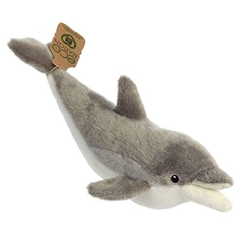 Gray plush dolphin toy with a cardboard tag attached to its fin.