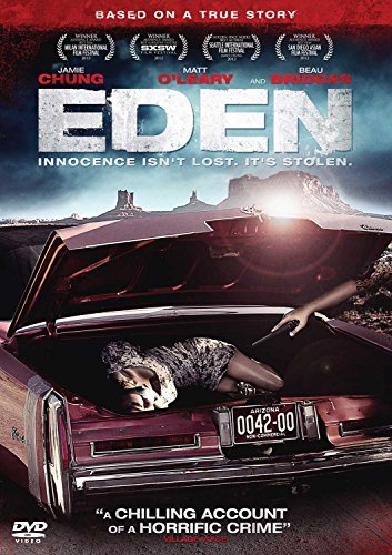 Blu-ray cover art showing a woman lying in a car trunk at gunpoint.