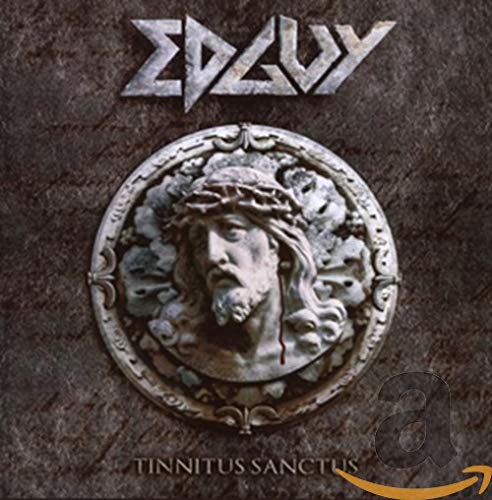 Edguy album cover: dark stone texture with a sculpted face and band logo.