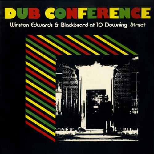 Black and white vinyl album cover with 10 Downing Street image and striped pattern.