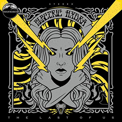 Vinyl cover art featuring a grey woman with yellow lightning eyes and snake motifs.