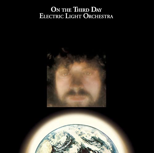 Album cover for Electric Light Orchestra’s “On The Third Day” featuring a portrait and Earth.
