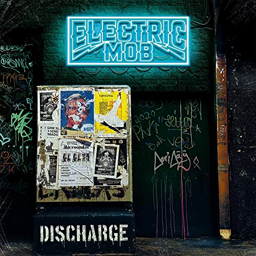 Album cover for Electric Mobās āDischargeā with graffiti and neon sign.