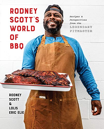 Cookbook cover featuring Rodney Scott, pitmaster, holding a rack of ribs.