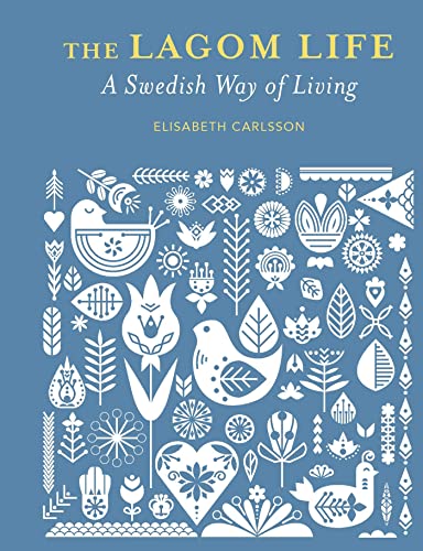 Book cover with white floral and bird designs on a blue background.