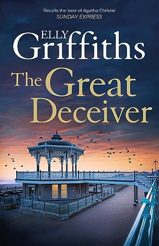 Book cover: “The Great Deceiver” with a coastal scene and bandstand.