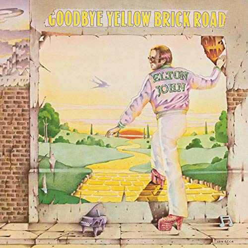 Elton John album cover, painted brick wall with a yellow brick road.
