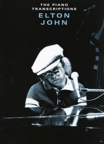 Elton John at a piano, cover of "The Piano Transcriptions" book.