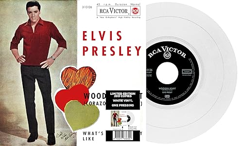 Elvis Presley record cover and white vinyl with heart imagery.