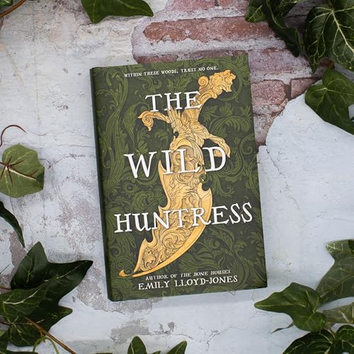 Book cover of The Wild Huntress featuring a gold ornate dagger on green background.
