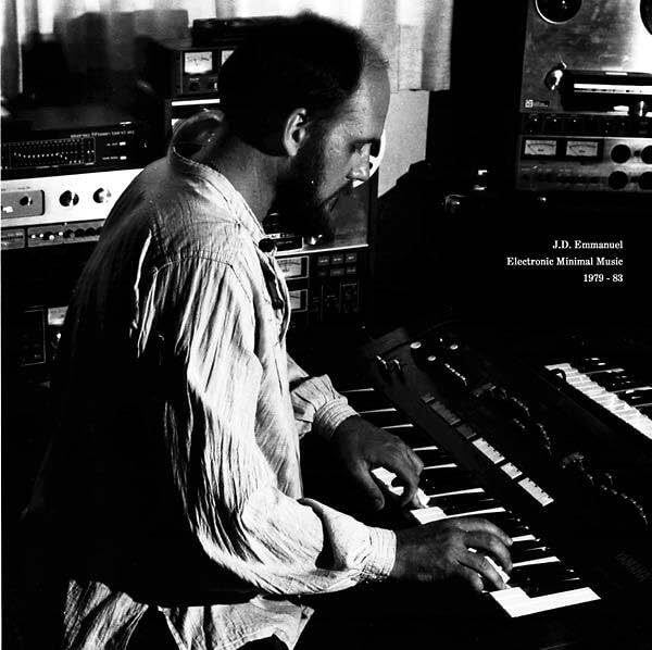 Black and white photo of J.D. Emmanuel at a synthesizer keyboard.