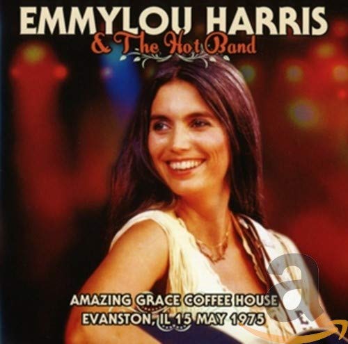 Emmylou Harris CD cover, portrait of a smiling woman with dark hair.