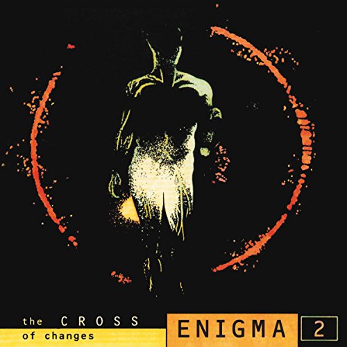Enigma album cover: dark figure within an orange circular design.