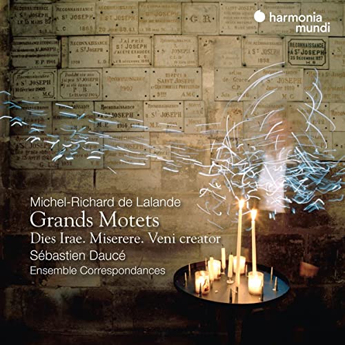 CD cover with candles, light trails, and aged stone wall background.