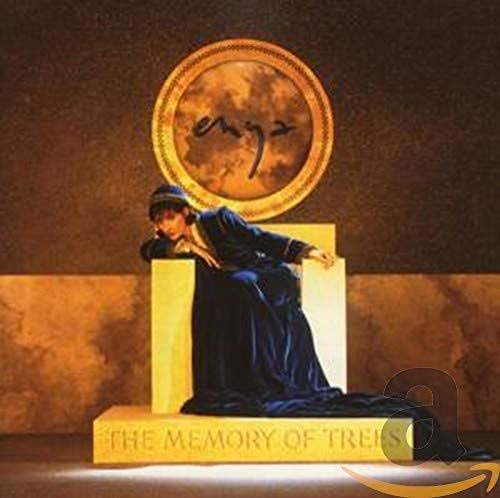 Enya album cover: a woman in blue seated before a golden frame.