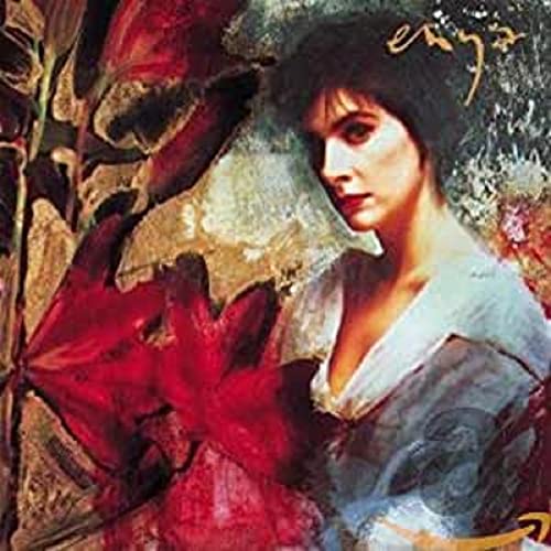 Enya’s “Watermark” CD cover: woman’s face amidst red and gold abstract art.