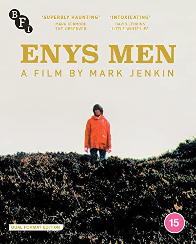 Blu-ray cover for “Enys Men” featuring a figure in orange on a hillside.