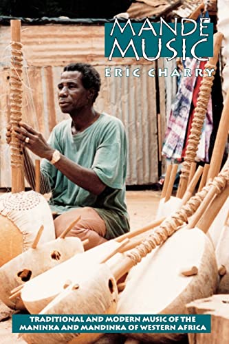 Book cover featuring a man playing a traditional African stringed instrument.