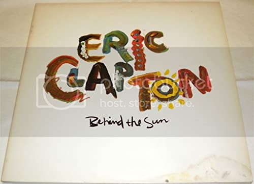 Vinyl album cover for Eric Clapton's Behind the Sun with colorful, stylized text.