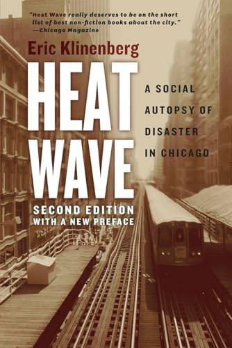 Book cover for āHeat Waveā with city buildings and train tracks.