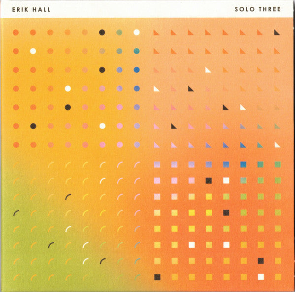 CD cover for Erik Hall’s “Solo Three” with colorful geometric pattern.