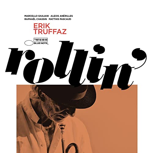 Album cover for Erik Truffaz Rollin' featuring a man in a hat with a trumpet.