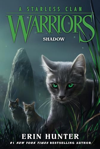 Book cover featuring a grey cat with green eyes and two other cats.