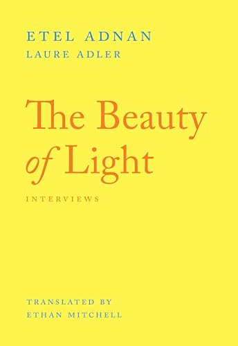 Yellow book cover with red title "The Beauty of Light: Interviews".