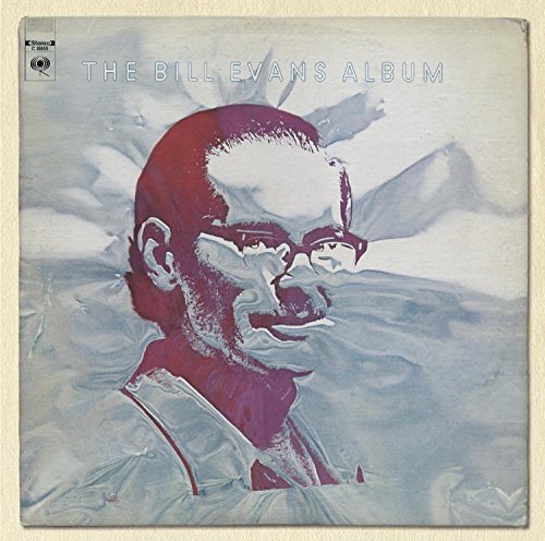 Album cover featuring a portrait of jazz pianist Bill Evans in pink and blue.