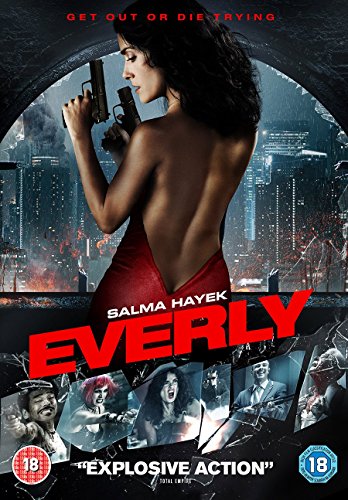 Salma Hayek in a red dress holding two handguns against a city background.