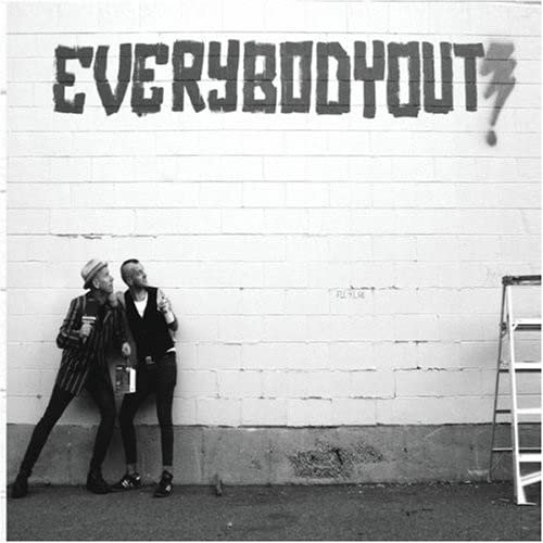 Black and white album cover with graffiti and two people.