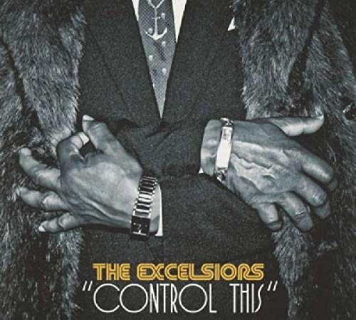 "Black and white album cover with man in suit and fur coat."