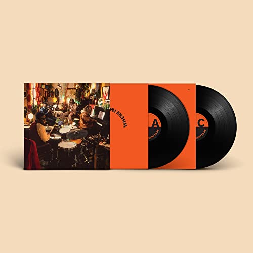 Ezra Collective vinyl album with an orange slipcase and two black records.
